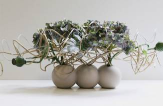 Kunstige blomsterarrangementer til interiøret