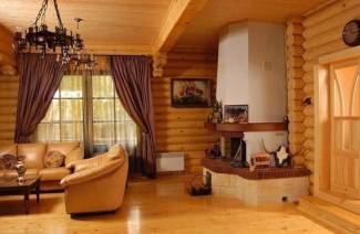 Isolamento del pavimento in una casa di legno dal basso