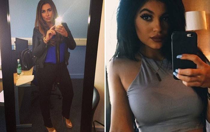 الفتيات تأخذ صورة شخصية من قبل المرآة