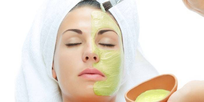 Girl apply cosmetic mask