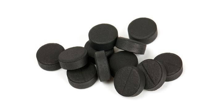 Tablete de carbon activat