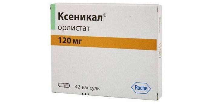 Xenical tabletės pakuotėje