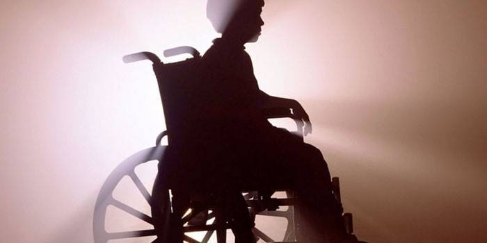 Enfant en fauteuil roulant