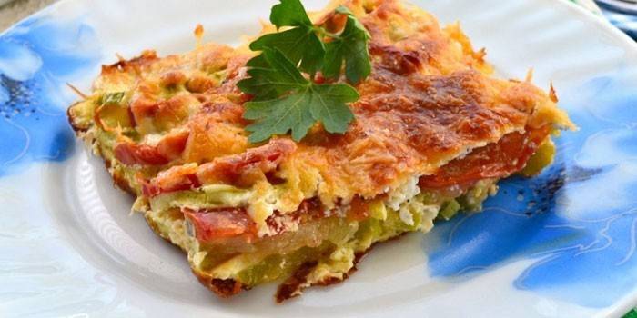 Zucchine e casseruola di pomodoro