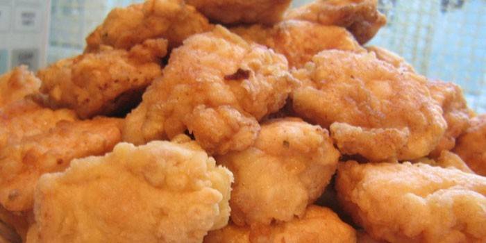 Tranches de filet de poulet frit