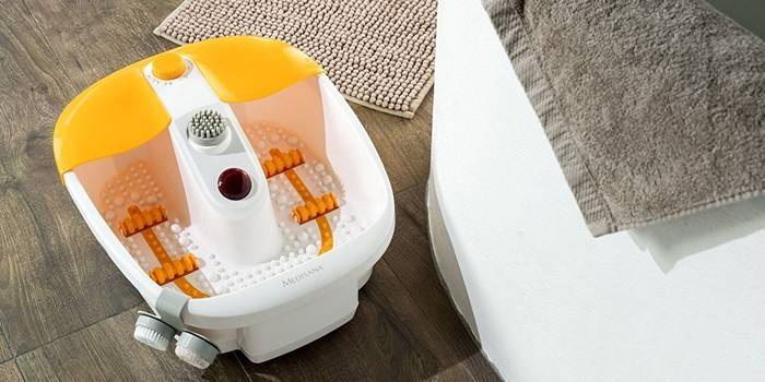 Massageador hidráulico para as pernas Medisana FS 883