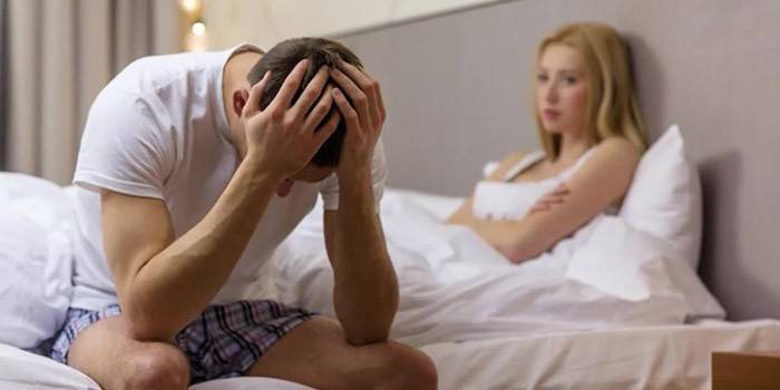 Hombre y mujer en el dormitorio