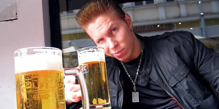 Guy and two glasses of beer