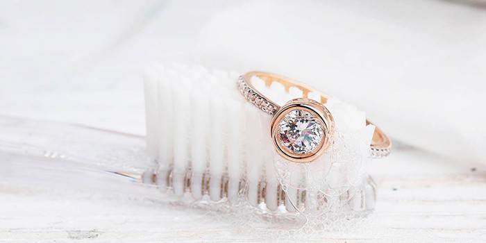 Toothbrush and stone ring