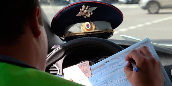 Inspector fills out a protocol