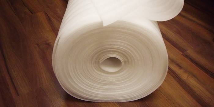 Laminated foam backing